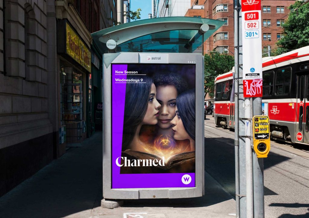 Charmed poster displayed on a bus shelter